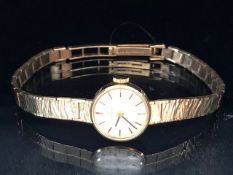 9ct yellow gold ladies Tissot watch on 9ct tapered bark finish bracelet approximately 14.98g