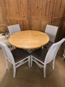 Modern furniture, Round extending dining table wooden top on central capstan with four legs