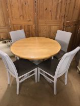 Modern furniture, Round extending dining table wooden top on central capstan with four legs