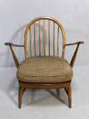 Mid century furniture, Ercol Windsor style arm chair in blonde wood with one original cushion