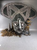 African interest: Large woven tribal mask with painted decoration, approx 69cm in height x 80cm wide