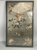 Antique Chinese Silk embroidered panel decorated with designs symbolising health wealth and
