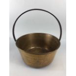 Antique Bronze cooking or maslin pan with steel handle approximately 28cm across