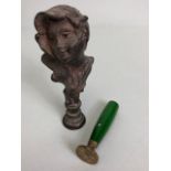 Art nouveau patinated bronze seal stamp formed as a young lady enveloped in oak leaves,