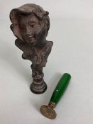 Art nouveau patinated bronze seal stamp formed as a young lady enveloped in oak leaves,