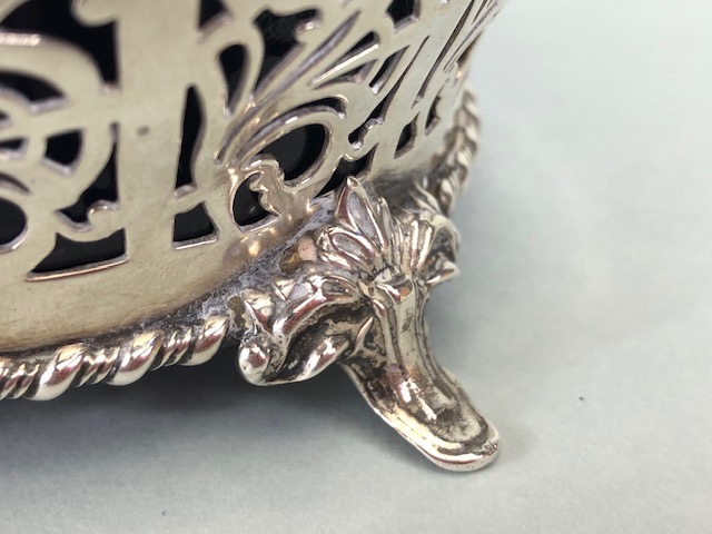 Silver hallmarked open work or pierced design basket with twin handles on four splayed feet - Image 4 of 11