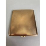 9ct Gold Cigarette case with hinged and sprung lid, engine turned decoration front and back maker