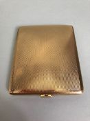 9ct Gold Cigarette case with hinged and sprung lid, engine turned decoration front and back maker