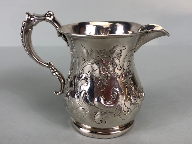 Victorian Silver Hallmarked Cream Jug Birmingham 1877, decorated with repousse flora and foliage and - Image 3 of 10