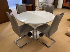 Modern Furniture, round extending 4 seater dining table in a white glaze finish with central