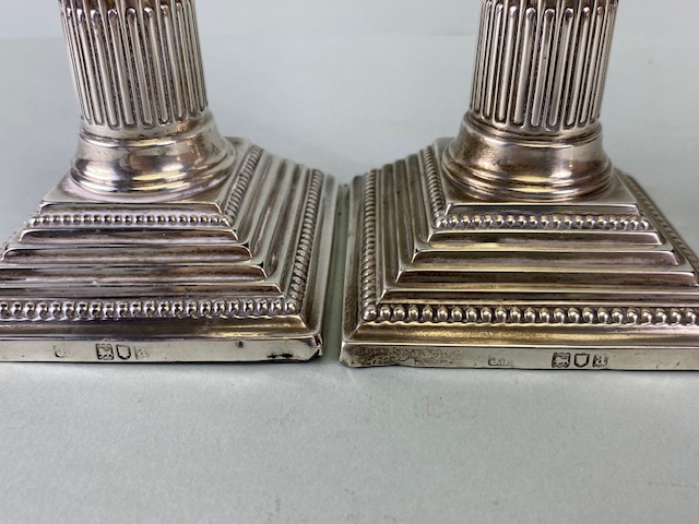 Pair of Victorian Hallmarked Silver Corinthian Column candlesticks on stepped bases with beaded - Image 9 of 11