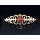 9ct gold Brooch set with a central Gemstone approx 42mm across and 4.6g