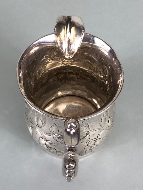 Victorian Silver Hallmarked Cream Jug Birmingham 1877, decorated with repousse flora and foliage and - Image 7 of 10