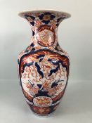 Oriental ceramics, Late 18th century Japanese Imari Vase, decorated in blue and red with images of