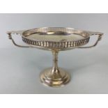 Silver sweet meat dish or Tazza with twin handles and pierced edges on a stepped pedestal base