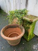 Three terracotta garden planters