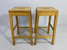 Pair of modern light wood bar stools, approx 66cm tall