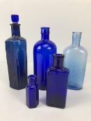Collection of Blue Bottles including one marked POISON and another for Woodward Chemist