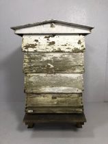 Beehive, vintage full size wooden bee hive consisting of 4 layers with stand and roof, distressed