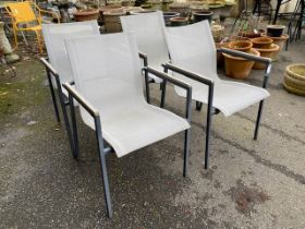 Four metal framed garden chairs