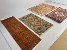 Collection of four modern rugs