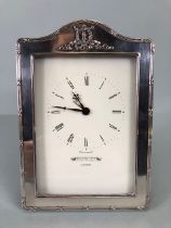 Quartz Clock with cream dial Marked for Harrods of London and mounted in a silver hallmarked frame