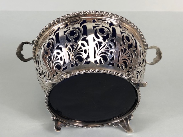 Silver hallmarked open work or pierced design basket with twin handles on four splayed feet - Image 7 of 11