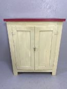 Vintage kitchen cupboard opening to two shelves and with red work surface, approx 77cm x 41cm x 93cm