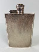 Silver hallmarked Hip flask with engine turned decoration and twist down lid hallmarked for