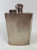 Silver hallmarked Hip flask with engine turned decoration and twist down lid hallmarked for