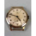 Tudor by ROLEX wristwatch with untested Gold case Roman numerals and subsidiary seconds dial.