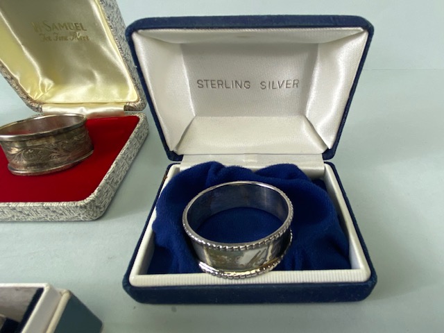Collection of four boxed Silver hallmarked various styles of napkin rings (total weight 109g) - Image 4 of 10