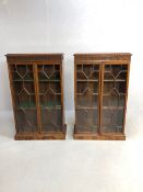 Antique Furniture, Pair of Reproduction Mahogany display cabinets with geometric glazed twin doors