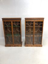 Antique Furniture, Pair of Reproduction Mahogany display cabinets with geometric glazed twin doors