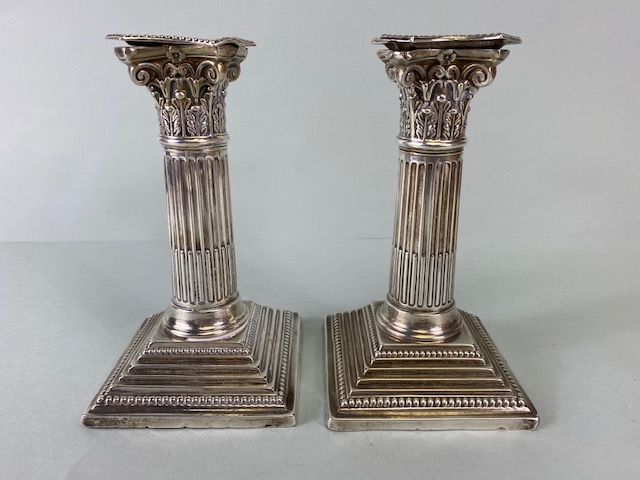 Pair of Victorian Hallmarked Silver Corinthian Column candlesticks on stepped bases with beaded