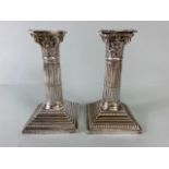 Pair of Victorian Hallmarked Silver Corinthian Column candlesticks on stepped bases with beaded
