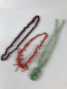 Vintage Jewellery, Coral necklace, Toffee amber necklace and a Chinese green hard stone bead