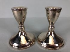 Pair of squat candlesticks marked Sterling approx 10cm tall marked Duchin Creation