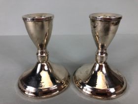 Pair of squat candlesticks marked Sterling approx 10cm tall marked Duchin Creation