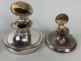 Two Silver Hallmarked circular inkwells with hinged lids the largest 10.5cm in diameter