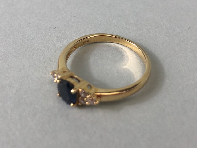 14ct yellow gold ring size 'L' with certificate set with a Blue Sapphire