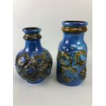 Mid Century pottery, an associated pair of West German vases by, Carstems, decorated in high