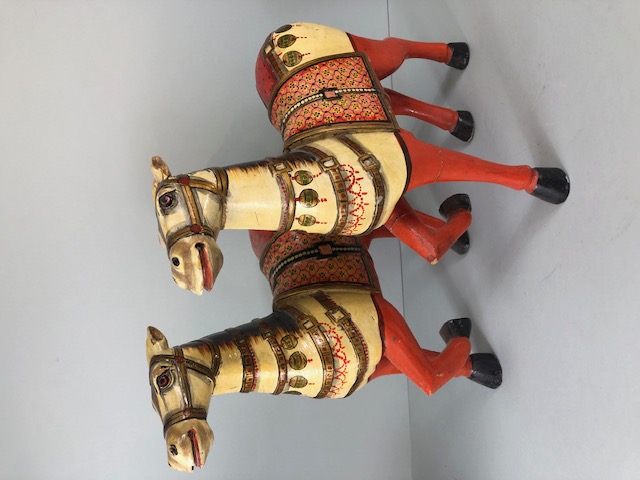 Decorative interest, pair of 20th century carved and hand painted wooden Indian horse statues both
