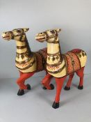 Decorative interest, pair of 20th century carved and hand painted wooden Indian horse statues both