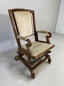 American wooden framed sprung rocking chair