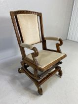 American wooden framed sprung rocking chair