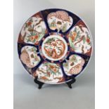 Oriental ceramics, a larger Imari charger decorated with panels of birds and a phoenix to the