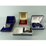 Collection of four boxed Silver hallmarked various styles of napkin rings (total weight 109g)