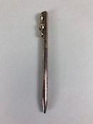 Silver Hallmarked Tiffany & Co ball point pen, the pocket clip fashioned as a treble clef, with a