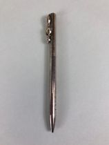 Silver Hallmarked Tiffany & Co ball point pen, the pocket clip fashioned as a treble clef, with a